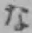 「な」字