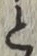 “と”字