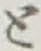 “と”字