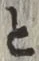 “と”字