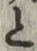 “と”字