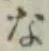 「な」字