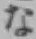 「な」字