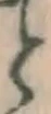 “と”字